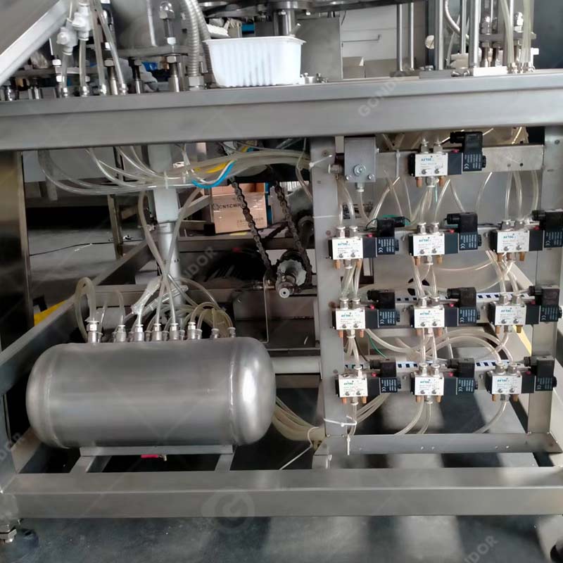 Industrial ice cream cone filling machine