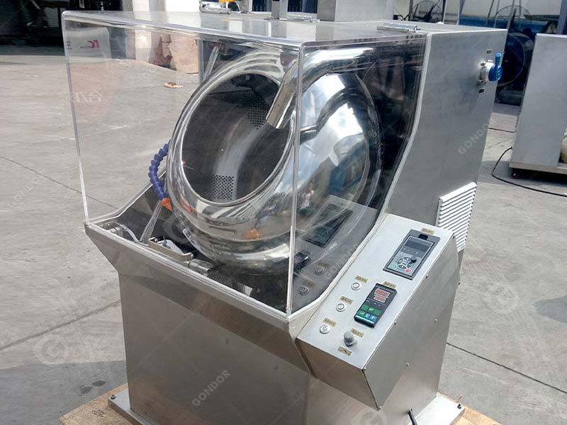 Candy coating machine with advanced spraying nozzle