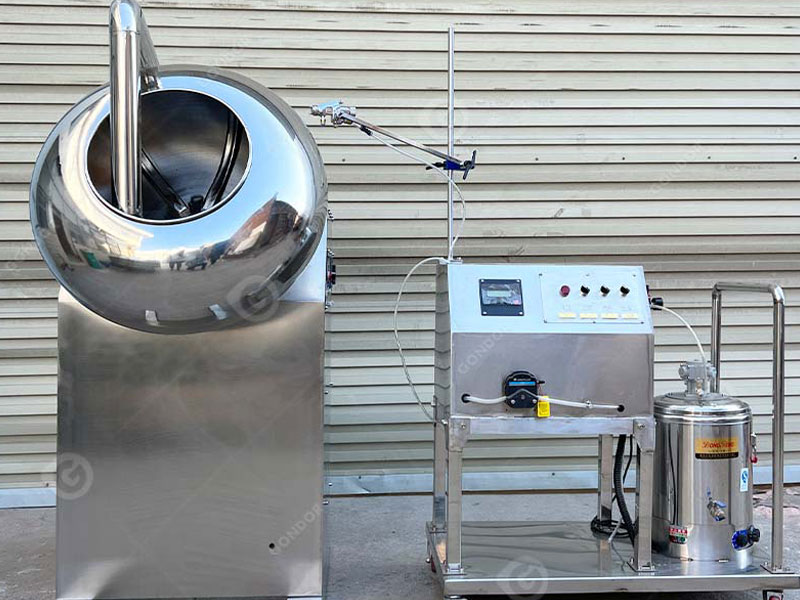 Candy coating machine with temperature - regulation for coatings