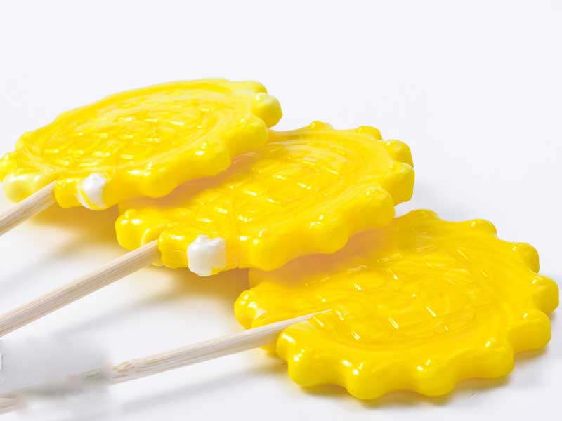 Traditional candy lollipop ingredients including sugar and corn syrup